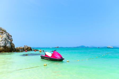 PHANG NGA,THAILAND - MARCH 24 : Magenta Jet ski on the beach of Andaman Sea in summer vacation at Khai Nok island. - 24 March 2015, Phang Nga, Thailandのeditorial素材