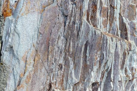 Background of brown stone wall texture photo