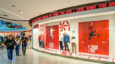 BANGKOK, THAILAND - DECEMBER 22, 2018 : Front of Uniqlo store. Luxury and fashionable brand window...