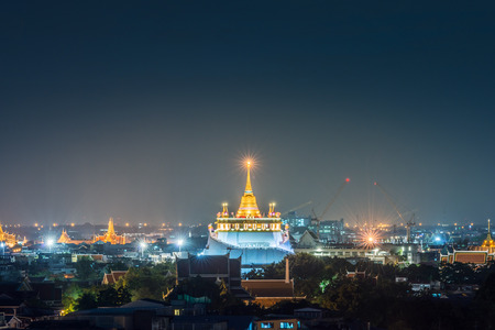 Famous Wat Saket Golden Mount in night  at Bangkok,Thailandの写真素材