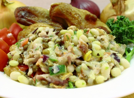 bean and lentil salad with smoked chicken wingsの写真素材