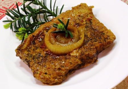  this grilled pork steak with onion sauce の写真素材