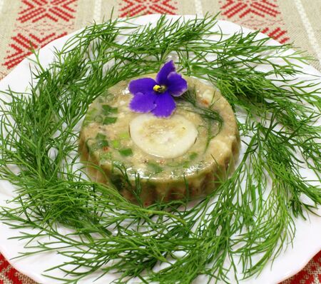 meat jelly snack of freshly cut dill white plate の写真素材