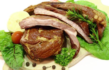 this is a smoked pork ribs with vegetables in aの写真素材