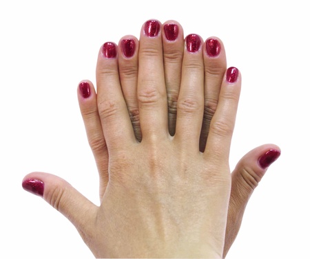  two women hands with red nails on a white background の写真素材