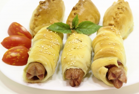 This is the sausage in dough white plateの写真素材