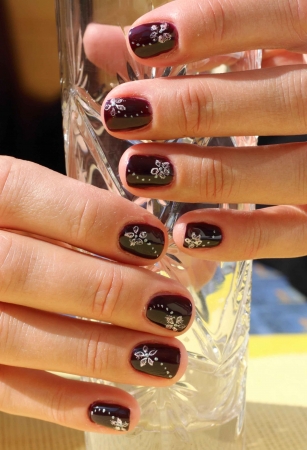 Woman fingers with decorated nailsの写真素材
