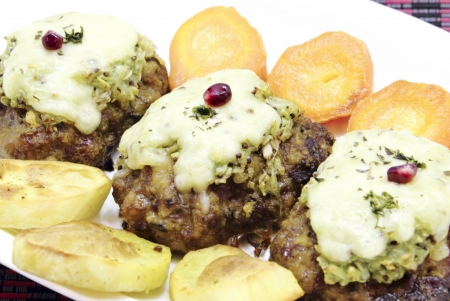 It is a fried pork cutlets served with fried carrots and potatoesの写真素材