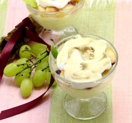Rice pudding with apples cranberries and grapes の写真素材