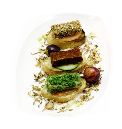 Liver pate slices Sprinkle with spices and herbs on a white backgroundの写真素材