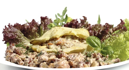patisson stuffed with minced meat, served with vegetables and openky mushroom sauceの写真素材