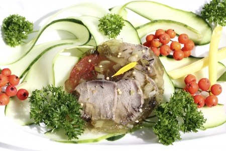 Tongue in  jelly  presented  with cucumber strips の写真素材