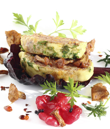 Freshly baked meatloaf with vegetables and mushroomsの写真素材
