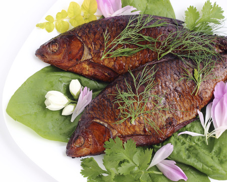 Close up smoked fish on a plateの写真素材