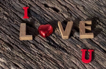 Valentines Day background.I love you alphabet wood on wooden background,copy spaceの写真素材