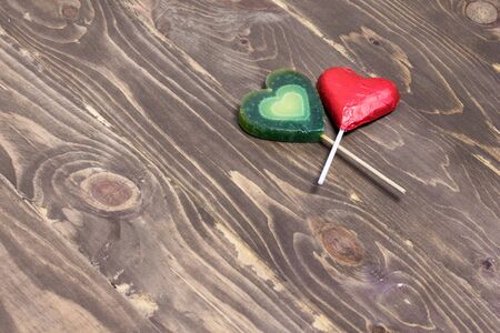 2 heart shape on wood background.の写真素材