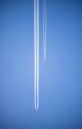 Competition of a big and small Airlinerの写真素材