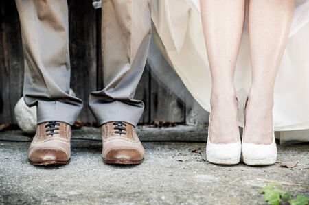 detail view of the feet of a wedding coupleの写真素材