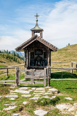 small wooden chapel in the austrian alpsの写真素材