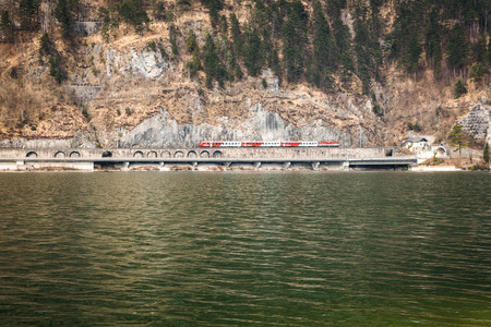 Red train in the mountain of the austrian alps