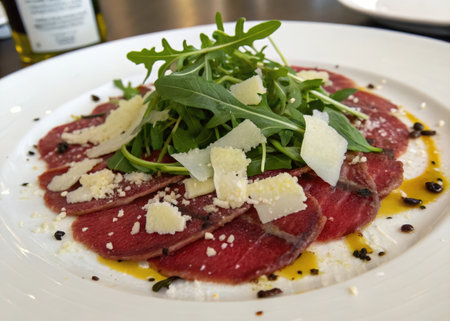 meat carpaccio with parmesan cheese and arugulaの素材