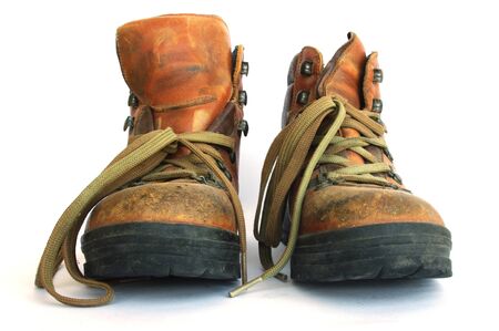 Sturdy, well worn leather hiking boots.の写真素材