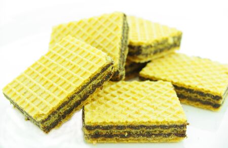 a stack of chocolate wafer biscuits. Isolated on whiteの写真素材