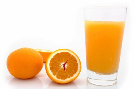 A glass of fresh orange juice. Shot on white.の写真素材