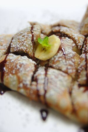 Banana amd Chocolate Crepe. High Key shot with shalow depth of fieldの写真素材