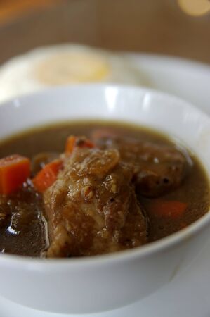 A delicious, hearty bowl of braised porkの写真素材
