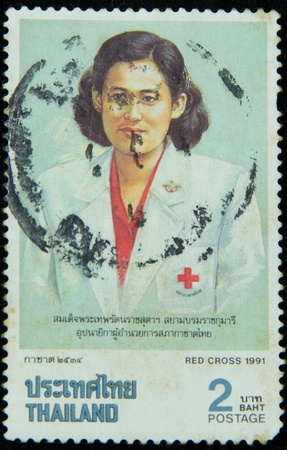 A stamp printed in Thailand shows Her Royal Highness
Princess Maha Chakri Sirindhorn,Red cross 1991のeditorial素材