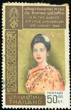 A stamp printed in Thailand shows H.M. The Queen's 3rd cycle anniversary 12th August 1968, circa 1968のeditorial素材