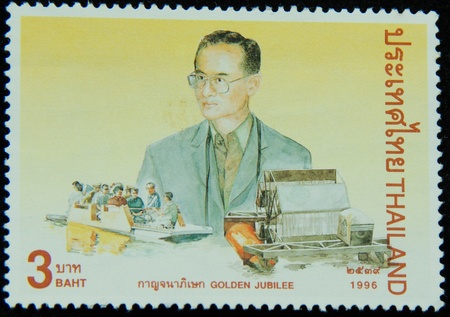 A stamp printed in Thailand shows portrait of Bhumibol Adulyadej Rama IX of Thailand ,Golden jubilee, circa 1996のeditorial素材
