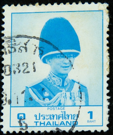 A stamp printed in Thailand shows portrait of Bhumibol Adulyadej Rama IX of Thailandのeditorial素材