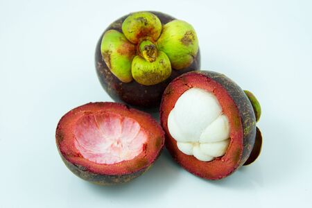 Tropical fruit Mangosteen isolated on white backgroundの写真素材