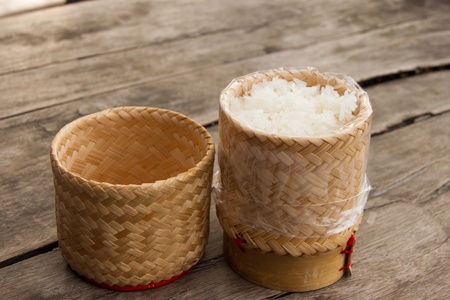 Rice wicker on wooden tableの写真素材