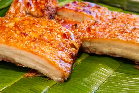 Crispy pork placed on a banana leafの写真素材