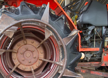 Tractor wheel on white backgroundの写真素材