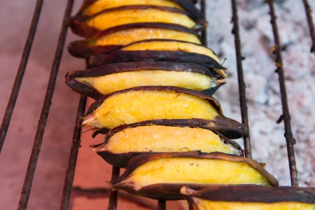 Banana grilled on charcoal brazierの写真素材