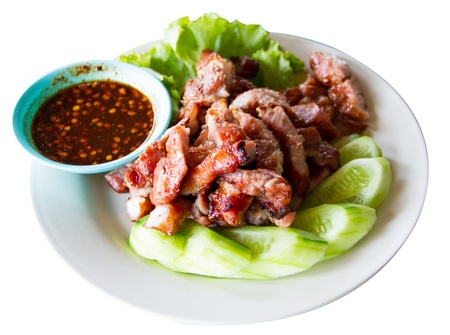 Grilled pork and sauce with cucumberの写真素材