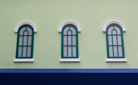 Window on the green wallの写真素材