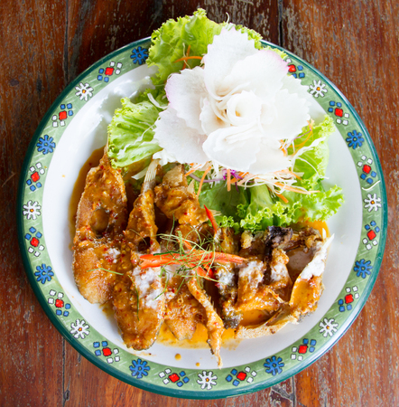 curry-fried fish on plateの写真素材