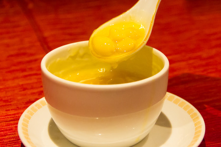 Ginkgo dessert in white bowlの写真素材