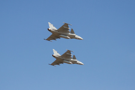 Couple fighter aircraft on the blue sky