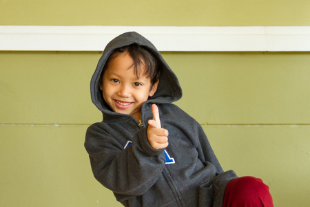 Little boy rapper on streetの写真素材