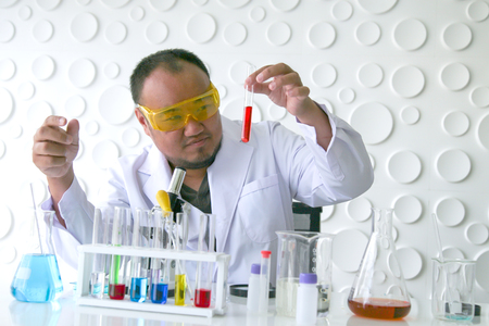 Scientists experiment in laboratory science.の写真素材