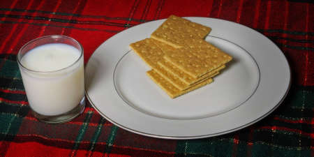 Graham crackers and glass of milkの写真素材