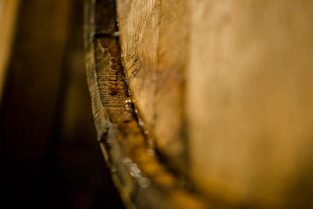woolden whiskey barrels stored on rack