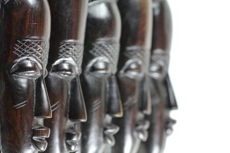 Five different African wooden masks looking to rightsideの写真素材