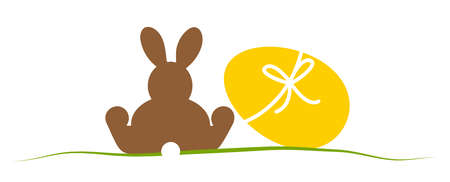 Illustration with easter rabbits in different brown colors for springtime advertising or traditional season conceptsのイラスト素材
